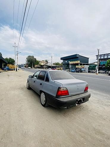 Daewoo Nexia: 1998 г., 1.5 л, Механика, Бензин, Седан