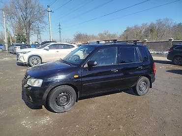 Mazda Demio: 2002 г., 1.5 л, Механика, Бензин, Хэтчбэк — 2