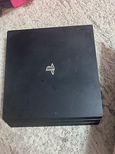 Игровая приставка Sony PlayStation 4 Pro. Модель в фирменном черном — 5