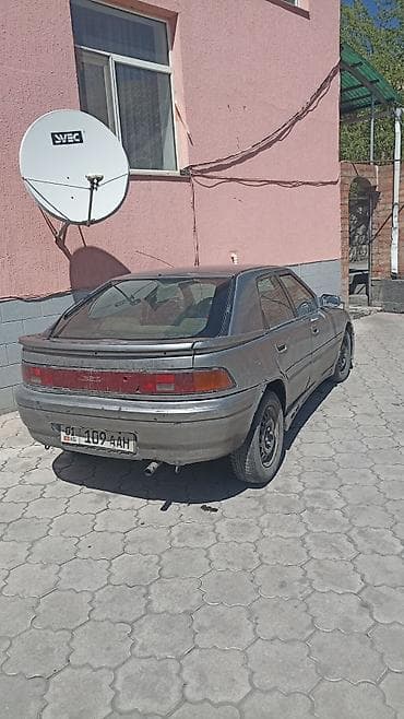 бампер дн8: Mazda 323: 1989 г., Лифтбек — 1