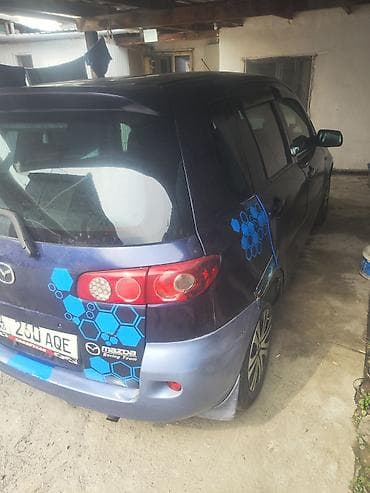 Mazda Demio: 2003 г., 1.3 л, Автомат, Бензин, Хетчбек — 5