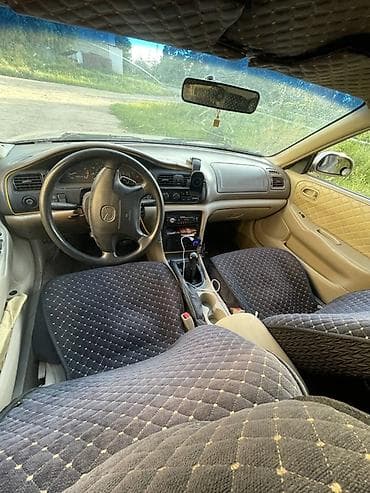 авто подборщик: Mazda 626: 1998 г., 2 л, Механика, Бензин, Седан — 9