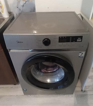 Стиральная машина Midea, фронтальная загрузка, серебристый корпус