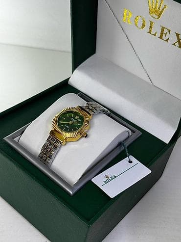 Rolex — наручные часы в фирменной коробке. Характеристики и дизайн: -