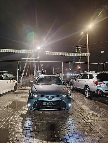 mitsubishi io: Toyota Corolla: 2021 г., 1.8 л, Вариатор, Гибрид, Седан — 1