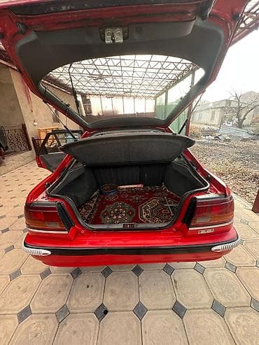 фид машина: Mazda 626: 1989 г., Механика, Бензин — 2