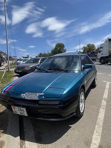 Унаа сатуу: Mazda 323: 1994 г., 1.6 л, Кол менен иштөөчү, Бензин, Хетчбек — 2