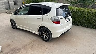 коропка на фит: Honda Fit: 2009 г., 1.5 л, Вариатор, Бензин, Хэтчбэк — 2
