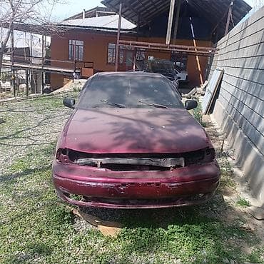 Продам автомобиль под разбор: седан бордового цвета, 4 двери. Кузов