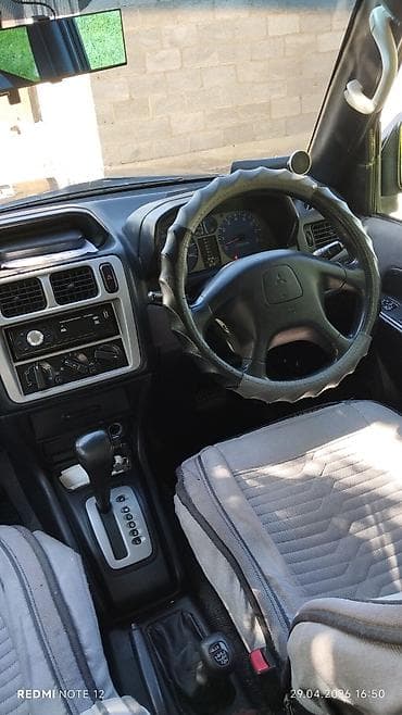 паджеро ио пинин: Mitsubishi Pajero iO: 2001 г., 2 л, Автомат, Бензин, Внедорожник — 5