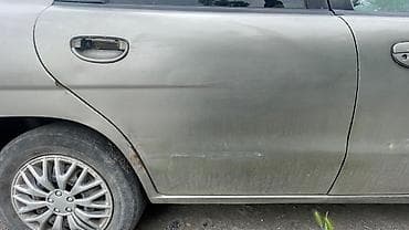 Продажа авто: Daewoo Nubira: 1999 г., Механика, Бензин, Седан — 10