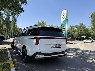 byd e2 2023: Kia Carnival: 2024 г., 1.6 л, Автомат, Гибрид, Минивэн — 10