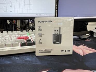 Модемы и сетевое оборудование: Ugreen CM760 AX300 USB — компактный беспроводной Wi-Fi адаптер — 2