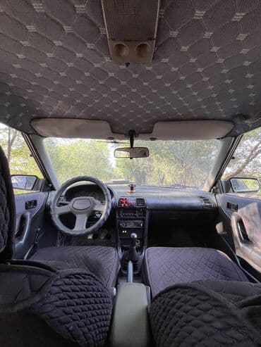 шины на гольф 2: Mazda 323: 1992 г., 1.6 л, Механика, Бензин, Хетчбек — 5