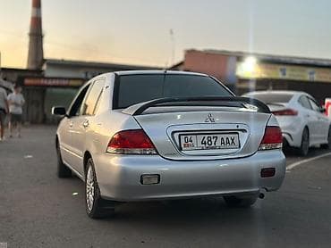 Mitsubishi Lancer: 2004 г., 1.6 л, Автомат, Бензин, Седан