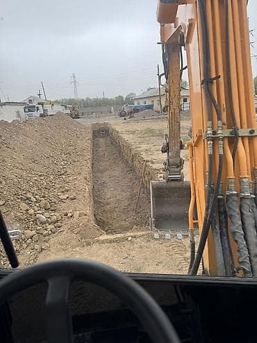 Услуга эксковатора . Транщея, септик, планировка участок, и т.д