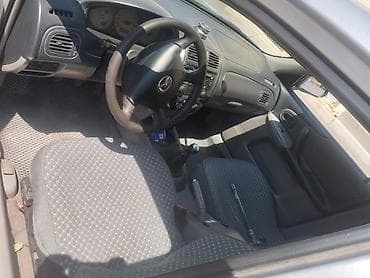 буксир: Mazda 323: 2003 г., Механика, Бензин, Универсал — 5