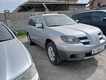 мицу: Mitsubishi Outlander: 2004 г., 2 л, Механика, Бензин, Кроссовер — 2