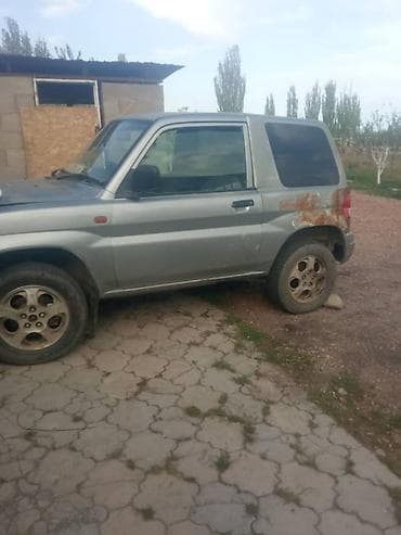 mazda 2000: Mitsubishi Pajero iO: 1998 г., Автомат, Бензин, Внедорожник — 1
