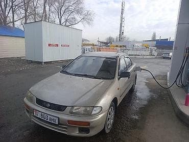 Mazda 323: 1996 г., 1.5 л, Механика, Бензин, Седан