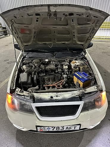 Daewoo Nexia: 2012 г., 1.5 л, Механика, Газ, Седан — 9