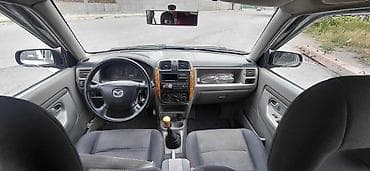 Унаа сатуу: Mazda Demio: 2002 г., 1.5 л, Кол менен иштөөчү, Бензин, Хетчбек — 5