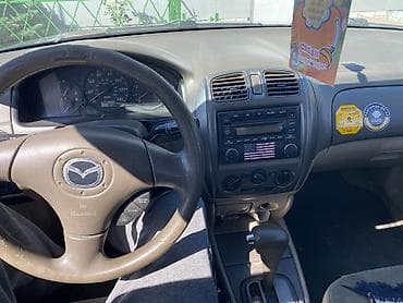 трактор мтз 89 1: Mazda Protege: 2002 г., Автомат, Бензин — 7