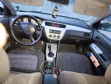 jac t9 hunter: Mitsubishi Lancer: 2005 г., Седан — 5