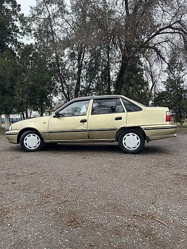 Транспорт: Daewoo Nexia: 2007 г., Механика, Бензин, Седан — 3