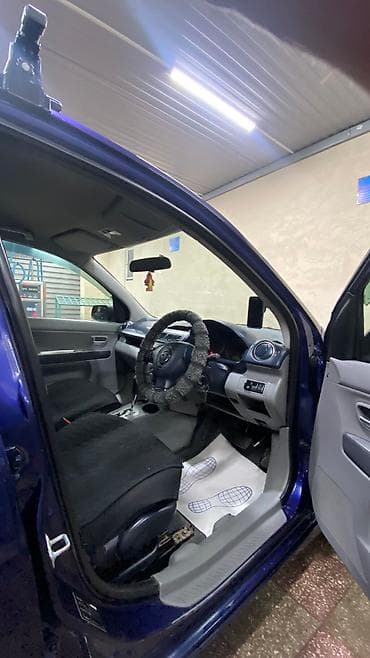 byd e1: Mazda Demio: 2003 г., 1.5 л, Автомат, Газ, Седан — 2