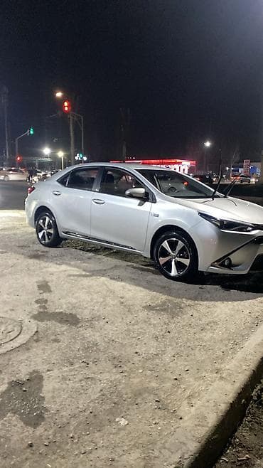 Toyota Corolla: 2020 г., 1.8 л, Автомат, Гибрид, Седан