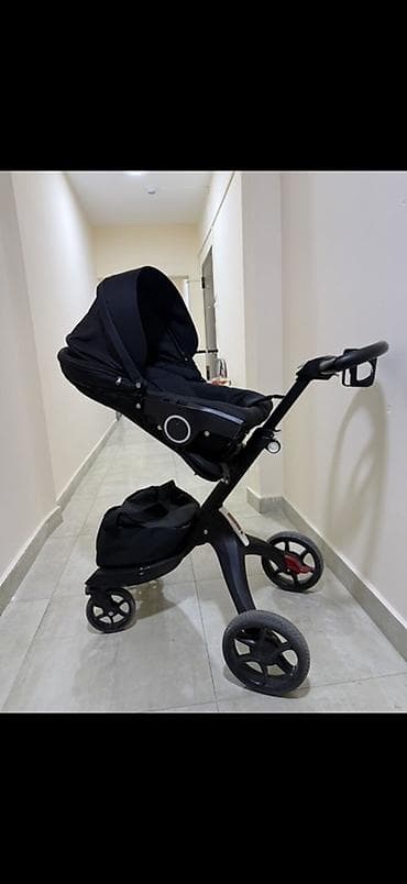 stokke: Детская коляска Stokke Xplory (черная) - Высокая посадка: ребенок — 2