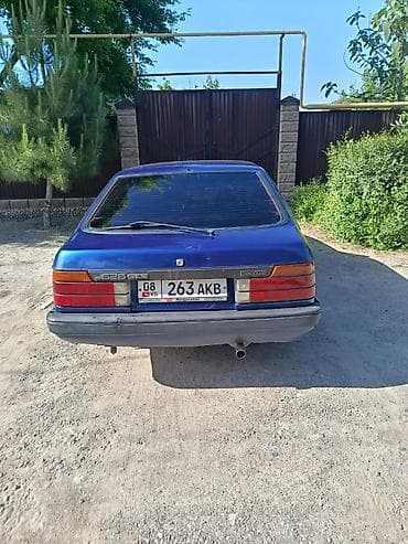 step rf3: Mazda 626: 1987 г., Хэтчбэк — 3