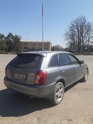 mazda 929: Mazda 323: 2003 г., 1.6 л, Механика, Бензин, Универсал — 1