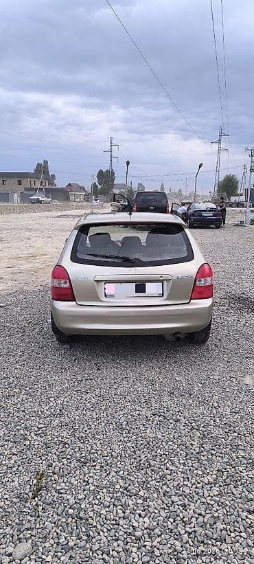 mazda 626 кронос: Mazda 323: 2003 г., 1.6 л, Автомат, Бензин, Хэтчбэк — 4
