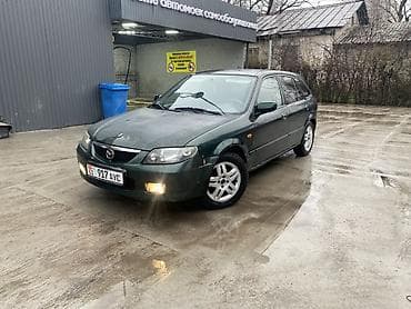 туманик мазда: Mazda 323: 2003 г., 1.6 л, Механика, Универсал — 3