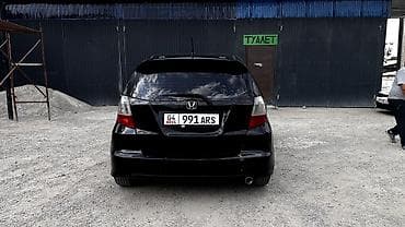 машины до 100к: Honda Fit: 2011 г., 1.5 л, Автомат, Бензин, Хэтчбэк — 4