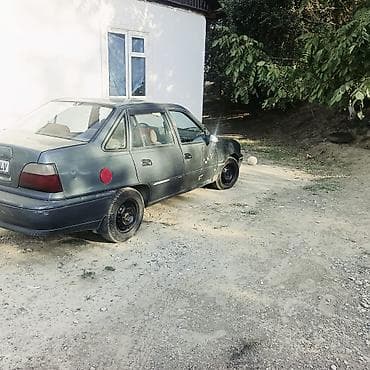 арзан машине: Daewoo Nexia: 1994 г., 1.5 л, Кол менен иштөөчү, Бензин, Седан — 4