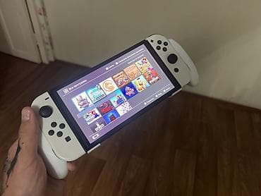 Nintendo: Nintendo Switch OLED (белая) - Экран 7" OLED с яркими цветами и — 5