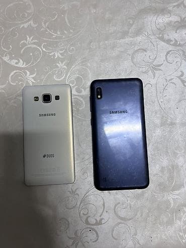 самсунг 06: Два смартфона Samsung. 1) Samsung Galaxy A3 (серия A, DUOS), белый: - — 2