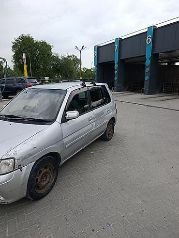 Транспорт: Mazda Demio: 2001 г., 1.3 л, Автомат, Бензин, Хэтчбэк — 2