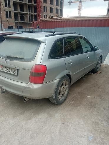 mini car: Mazda Familia: 2003 г., Универсал — 4