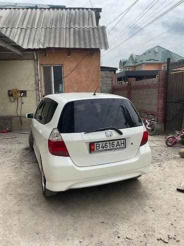 windom поворотник: Honda Fit: 2006 г., 1.3 л, Хэтчбэк — 3