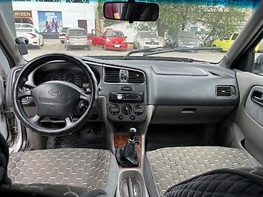 sg 9: Nissan Primera: 1999 г., 1.8 л, Механика, Бензин, Универсал — 8