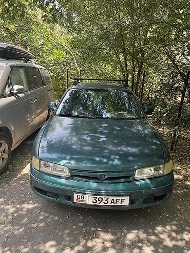 Mazda Cronos: 1992 г., 2 л, Механика, Бензин, Седан