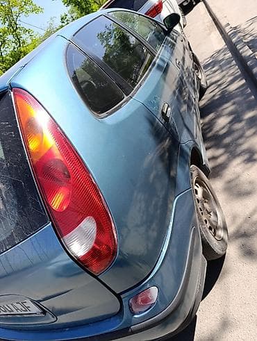 Продам Nissan Almera Tino 2003 г. выпуска газ/бензин 1.8 состояние