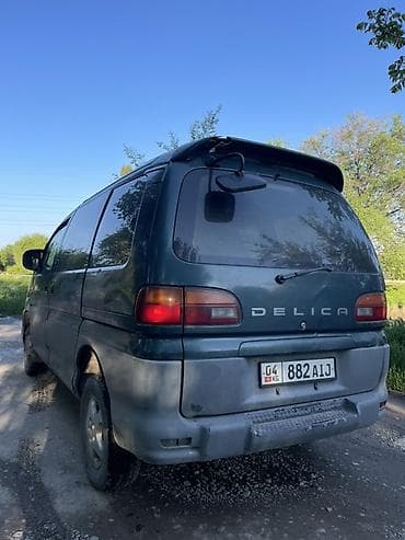 диски на мицубиси делика: Mitsubishi Delica: 1998 г., 2.5 л, Автомат, Дизель, Минивэн — 5