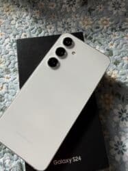 Samsung Galaxy S24, Б/у, 256 ГБ, цвет - Серый