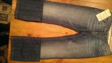 Джинсы новые