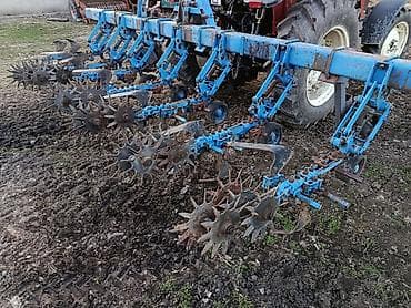 Культиватор-полуницевый междурядный навесной окучник Описание: -